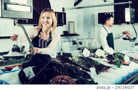Two sellers in fish store Two sellers in fish store 29726037