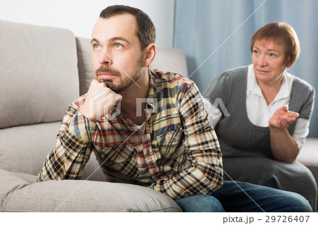 Elderly mother and son quarrel Elderly mother and son quarrel 29726407