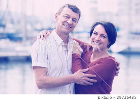 couple hugging outdoors at spring day 29726435