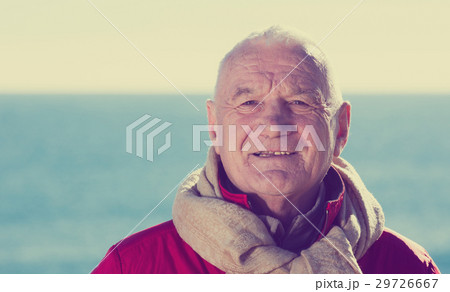 Mature man walking by sea 29726667