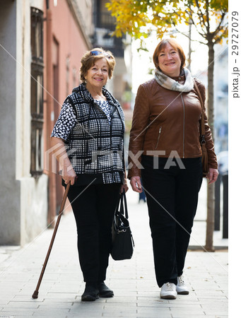 Mature women having a walk 29727079
