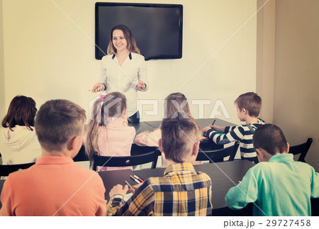 Little children with teacher in classroom 29727458