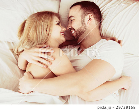 Couple making love in bedroom Couple making love in bedroom 29729168