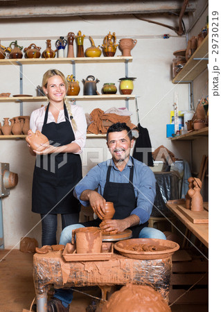 Happy artisans in ceramics workroom Happy artisans in ceramics workroom 29730219