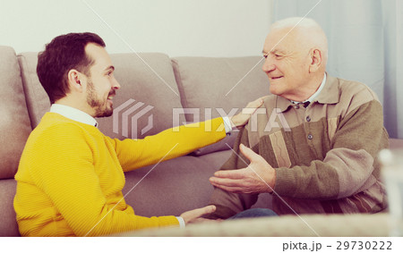 Old father and son friendly conversation Old father and son friendly conversation 29730222