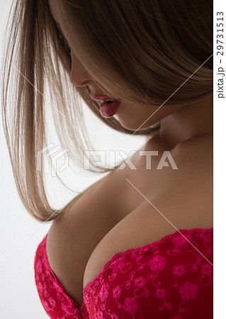 Young beautiful girl with magnificent breasts chic - Stock Photo