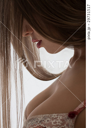 Young beautiful girl with magnificent breasts chic - Stock Photo 29731517 