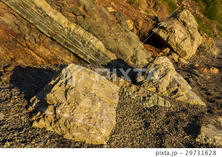 Rock on the city beach on Ozernovskaya spit, shore Rock on the city beach on Ozernovskaya spit, shore 29731628