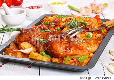 grilled chicken on baking tray with veggies 29735094