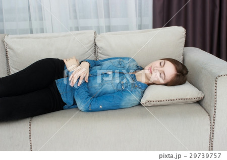 Beautiful woman In black pants and a blue shirt 29739757