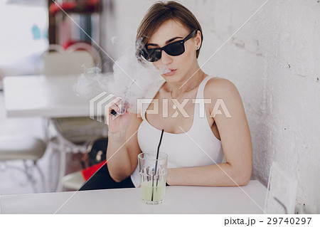 girl with the electronic cigarette 29740297