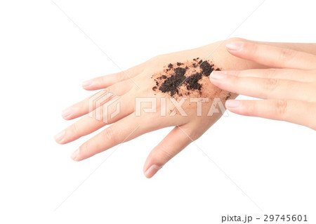 Woman's hand with scrub coffee grounds 29745601