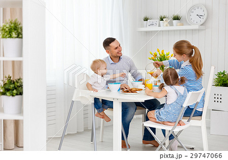 Happy family  at breakfast 29747066