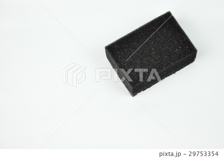Black sponge used for washing dishes. Black sponge used for washing dishes. 29753354