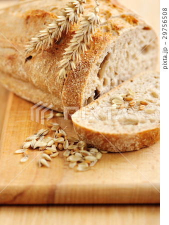 Close-up on traditional bread on wooden board Close-up on traditional bread on wooden board 29756508