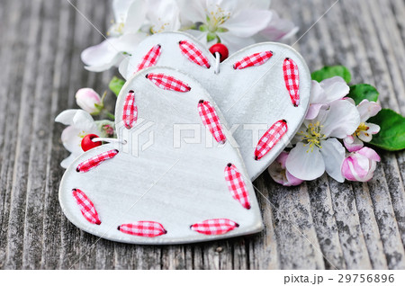 Spring Blossom and hearts over wooden background 29756896
