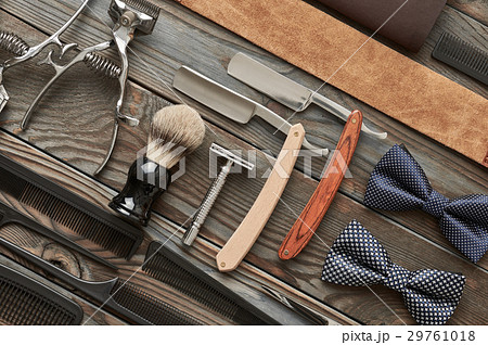 Vintage barber shop tools on wooden background 29761018