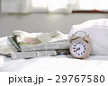 目覚まし時計(07:45)と英字新聞 目覚まし時計(07:45)と英字新聞 29767580