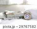 目覚まし時計(07:55)と英字新聞 目覚まし時計(07:55)と英字新聞 29767582