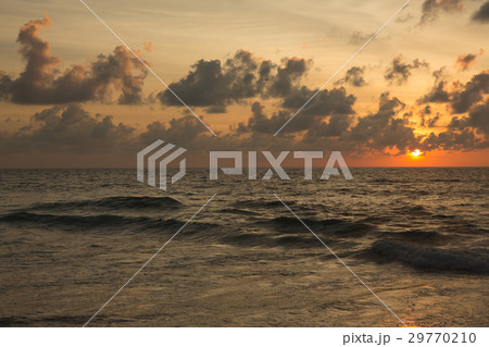 a beautiful sunset in the sea 29770210