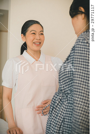 woman during pregnancy or shortly after childbirth 29771117