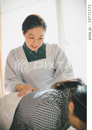 woman during pregnancy or shortly after childbirth 29771572
