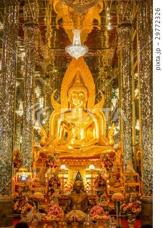 Golden Buddha image in church decorated with glass 29772326