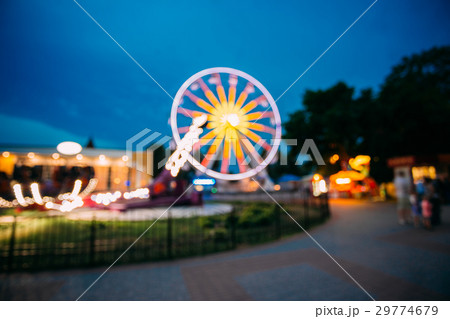 Abstract Blur Image Of Illuminated Ferris Wheel In 29774679