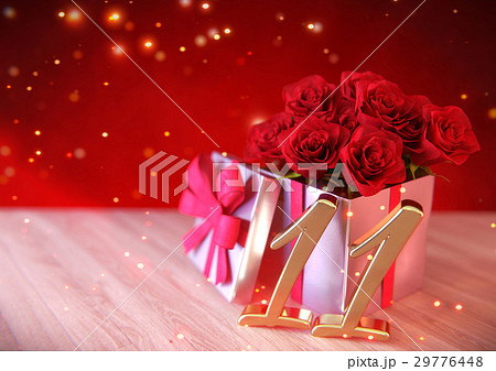 birthday concept with red roses in gift on wooden 29776448