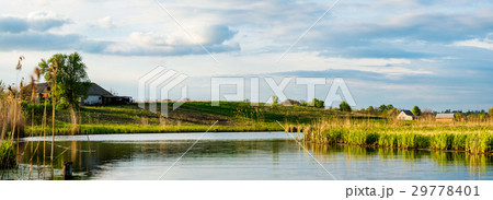 Village near the calm river Village near the calm river 29778401