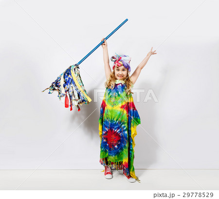 Happy blonde child girl in hippie colorful dress 29778529
