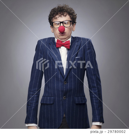 Businessman wearing clown nose Businessman wearing clown nose 29780002
