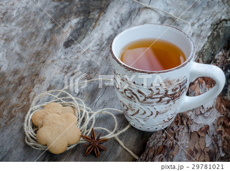 Gingerbread cookies with a mug of tea Gingerbread cookies with a mug of tea 29781021