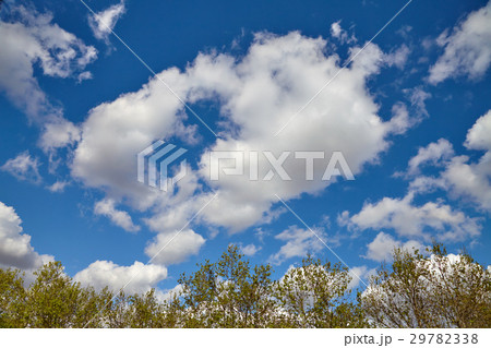 Beautiful clouds are moving against the blue sky Beautiful clouds are moving against the blue sky 29782338