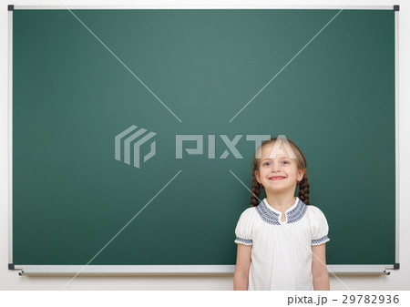 school student girl posing at clean blackboard 29782936