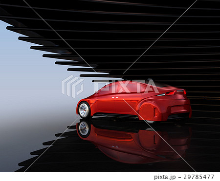 黒い背景の前にあるメタリックレッド塗装の電気自動車のイラスト素材