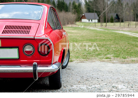 red retro car in the nature 29785944