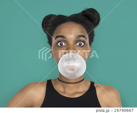 African Woman Blowing Bubble Gum Playful Portrait African Woman Blowing Bubble Gum Playful Portrait 29790667