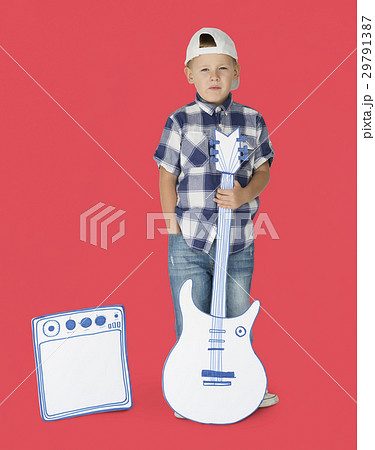 Portrait of a Little Blond Caucasian Boy with Guitar Isolated 29791387