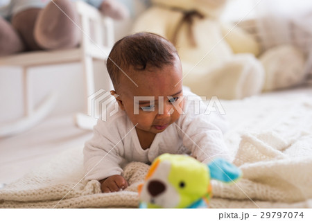 adorable african american baby boy playing with adorable african american baby boy playing with 29797074