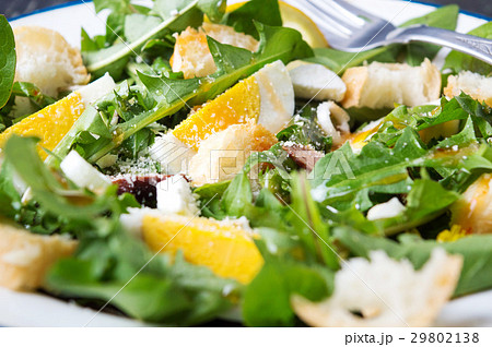 Dandelion leaves meal salad on a plate 29802138