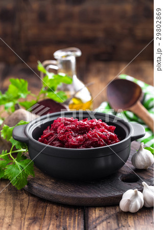 Beetroot salad on wooden background closeup 29802869
