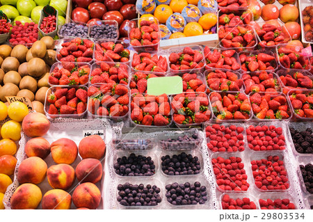 Strawberries bulk sale at outdoor market, 29803534