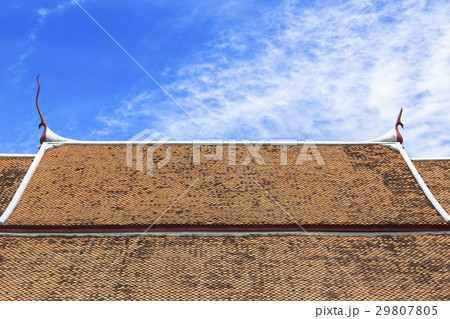 Orange roof tiles of Thai temple 29807805