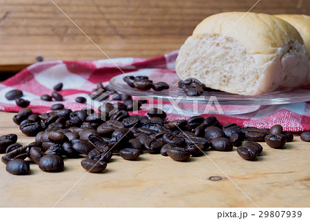 Coffee and bread wooden background Coffee and bread wooden background 29807939