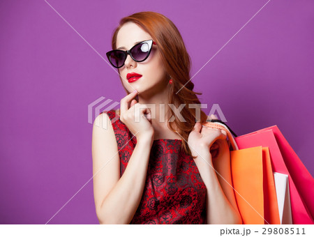 young woman with colorful shopping bags young woman with colorful shopping bags 29808511