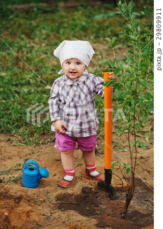 little funny boy with shovel in garden little funny boy with shovel in garden 29809911