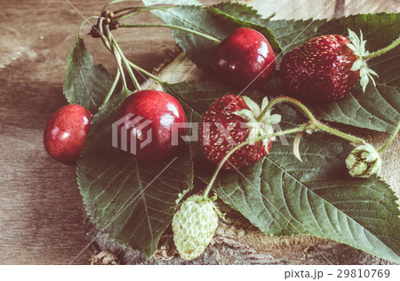 Fresh ripe organic cherries and strawberry. 29810769
