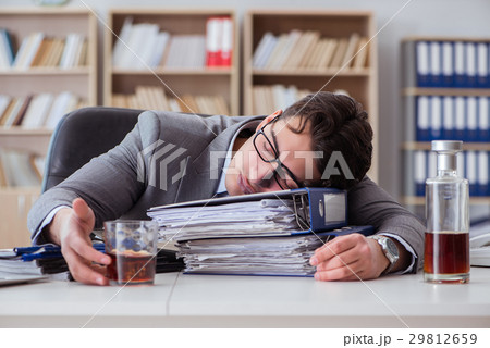 Businessman drinking in the office 29812659