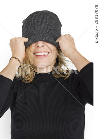 Caucasian Lady Beanie Covering Eyes Smiling 29817078